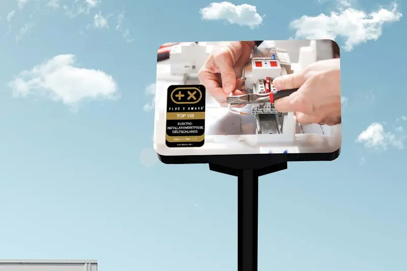 Plakat mit dem Siegel „Top 100 Elektro-Installationsbetriebe“
