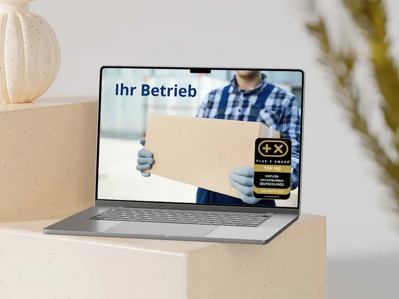 Website mit dem Siegel „Top100 Umzugsunternehmen Deutschlands“ auf einem Bildschirm