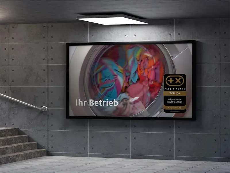 Plakat mit dem Siegel „Top 100 Wäschereien Deutschlands“