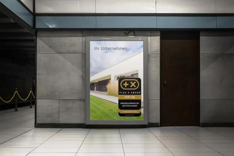 Plakat mit dem Siegel „Top 100 Immobilienmakler“