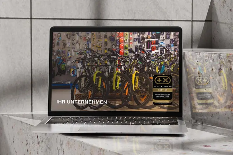 Website mit dem Siegel „Top 100 Fahrradhändler Deutschlands“ auf einem Bildschirm