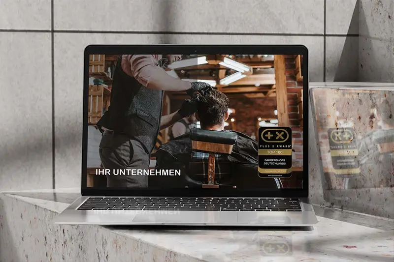 Website mit dem Siegel „Top 100 Barbershops Deutschlands“ auf einem Bildschirm