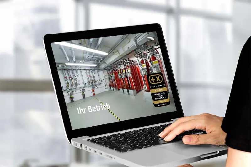 Website mit dem Siegel „Top 100 Brandschutz Betriebe Deutschlands 2025“ auf einem Bildschirm